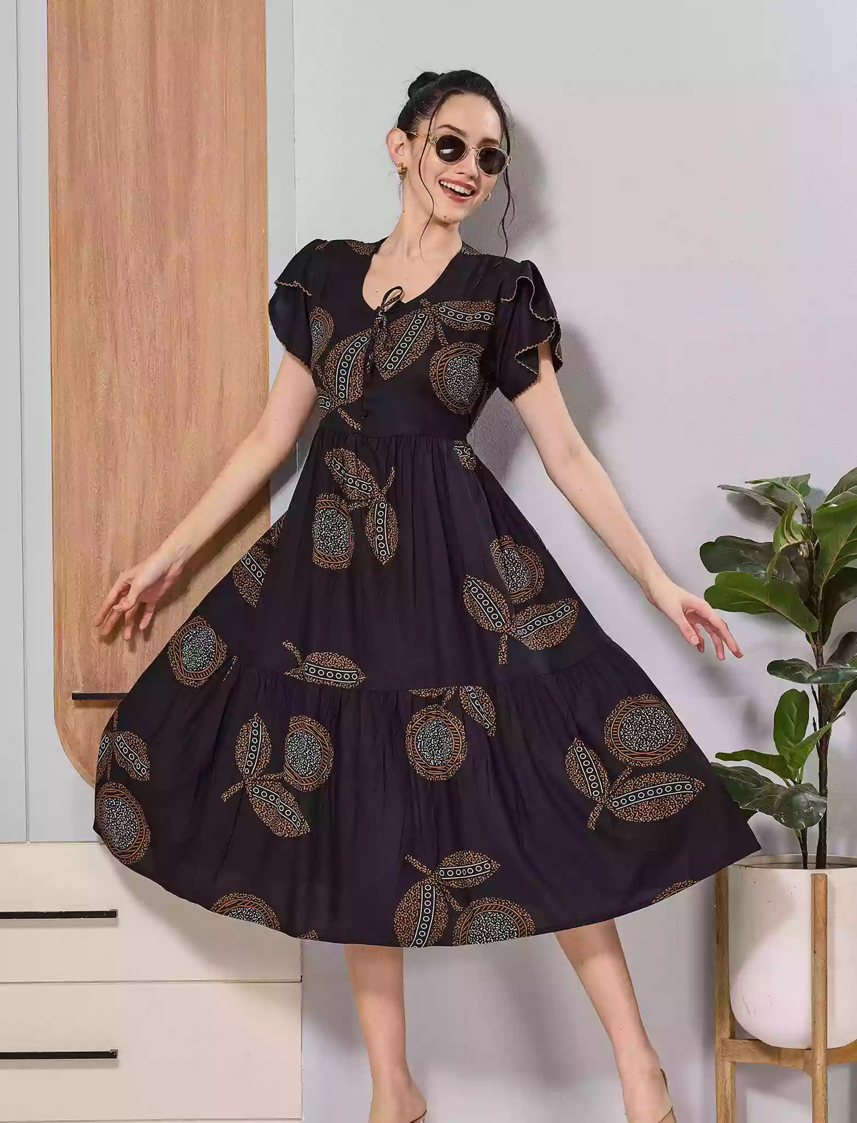Black Abstract Rayon Flared Zipless Maxi with Back Tie Bow
