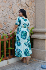 Sky Teal Bold Floral Rayon Foil Maxi Frock – Puff Sleeve Tiered Summer Dress with Adjustable Front Tie & Side Pockets